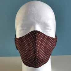 Kasvomaski ruskea vaalean punaisilla pilkuilla